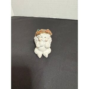 Dreamsicles, titled "Angel Sucking Its Thumb Boy‎